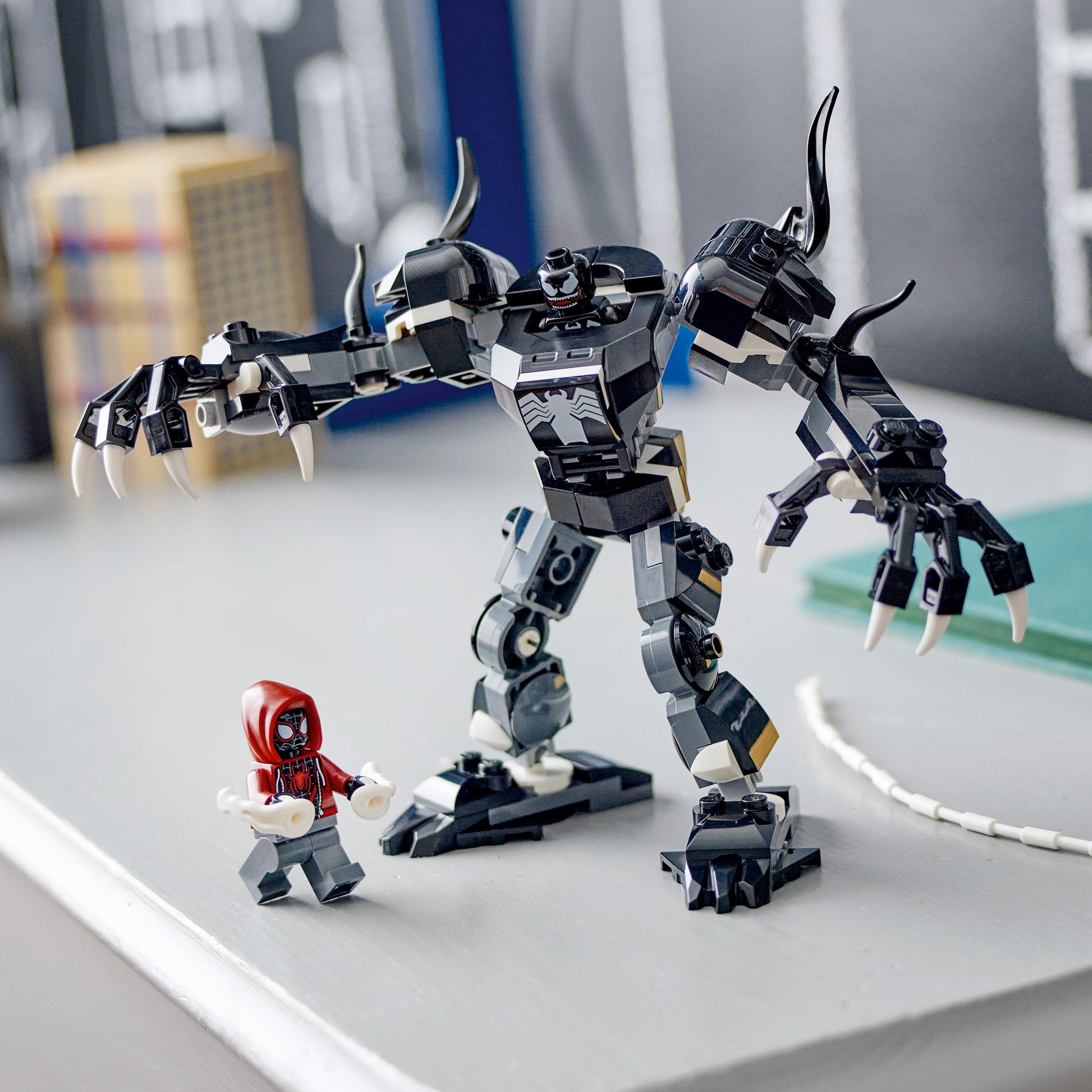 LEGO® Marvel Venom Mech Armour vs. Miles Morales 76276