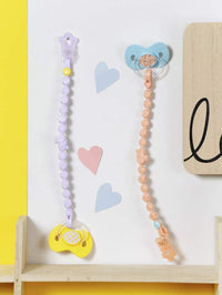 Baby Born Accs Magic Dummy with Chain assorted 43cm